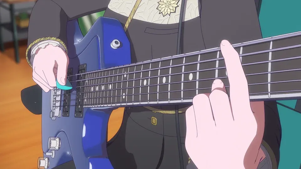 配信中に青いギターを演奏するクレマチス